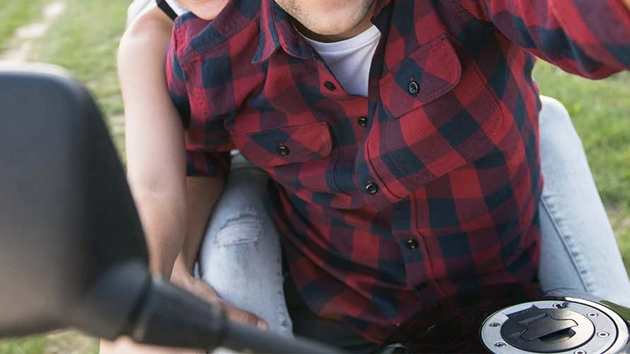 beautiful-young-couple-in-love-enjoying-a-quad-bike-ride-in-countryside-couple-driving-SBI-305226057