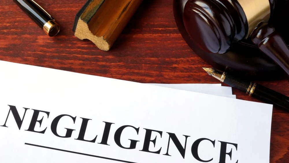 Negligence,Form,,Documents,And,Gavel,On,A,Table.