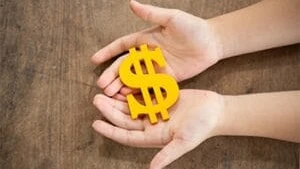 child-holding-yellow-dollar-sign-300x200